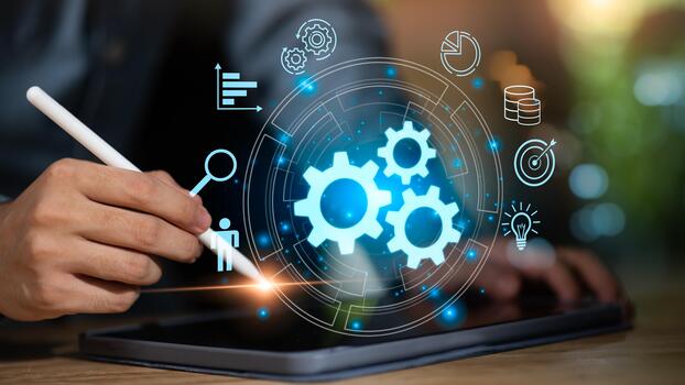 A businessman using a digital tablet with glowing gear icons, representing workflow automation, business process management, innovation, and efficiency powered by modern digital technology. photo