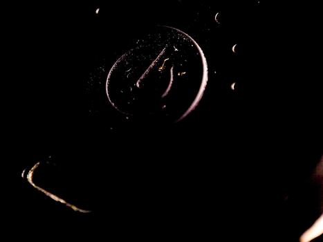 Abstract shapes of dark outlines emerge from darkness, creating a moody and mysterious atmosphere. photo