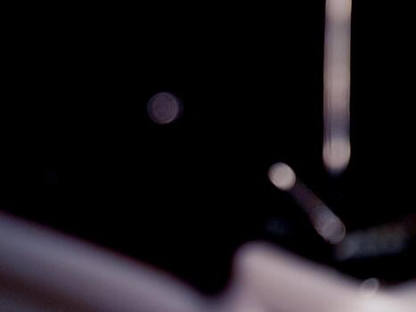 Abstract light play in a darkened space creates an ethereal, enigmatic and calming visual effect. photo