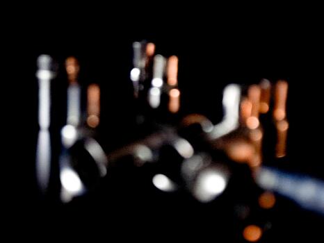 Abstract blurred lights in a dark room create a moody and mysterious visual experience at night. photo
