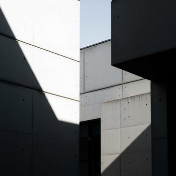 resumen arquitectónico estudiar de contrastando ligero y sombra en moderno edificio fachada creando geométrico formas foto