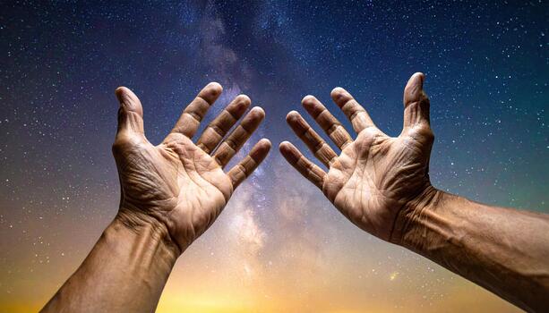 Open hands reaching toward starry sky with milky way and sunset horizon, symbolizing hope and connection with universe in peaceful night photo