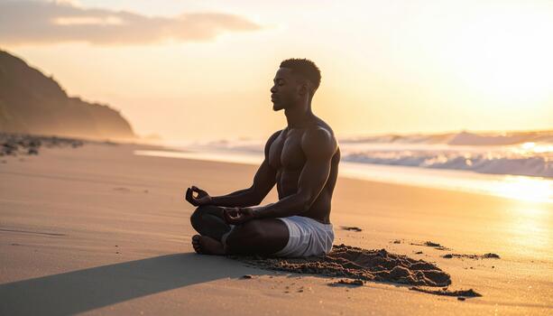 Muscular man practices meditation in seated lotus pose on sandy beach during peaceful sunset, surrounded by calm ocean waves and distant cliffs, radiating tranquility and focus photo