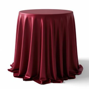 A round table covered with a luxurious deep red satin tablecloth, isolated on white background photo