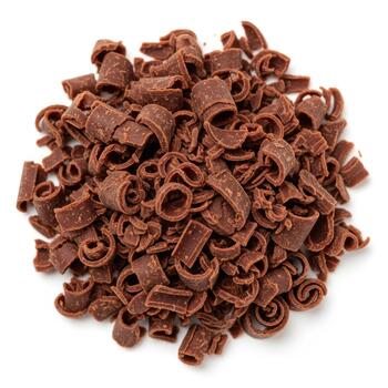 Pile of small chocolate shavings and curls, isolated on white background photo