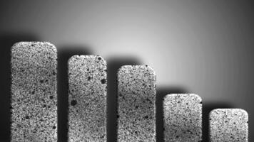 Rising rectangular stone pillars forming gradual balanced stepped pattern video