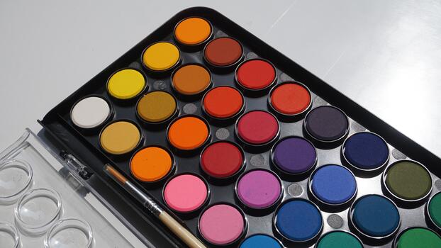 Palette of multicolored eyeshadow on white background photo