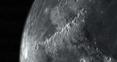 Montes Apenninus in the lunar surface of the moon in rotation, 3d render. video