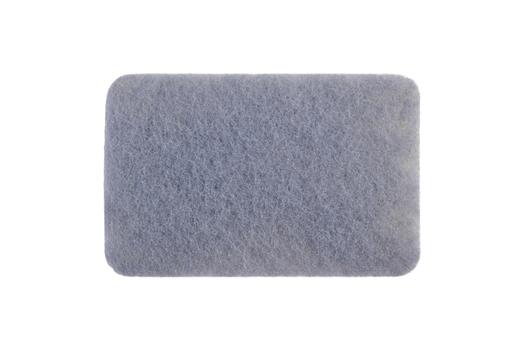 A soft, grey, rectangular bath mat with a subtle textured pattern, isolated on a white background. photo