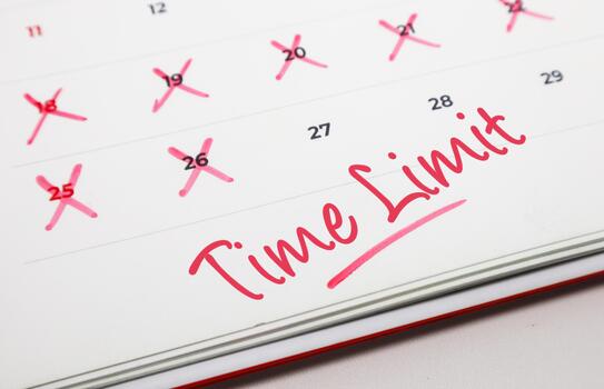 Red Time Limit on a calendar with crossed dates, emphasizing critical deadlines, project urgency, and effective time management photo