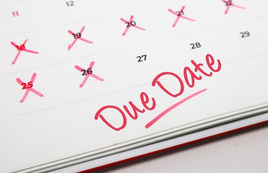 Calendar page with a red Due Date and crossed-out days, symbolizing deadlines, time management, and the urgency of completing tasks on schedule photo