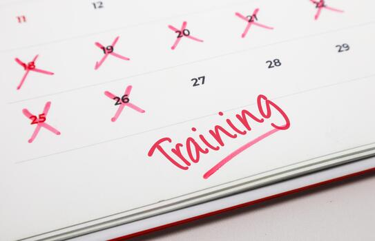 Calendar with Training prominently marked in red, symbolizing a planned professional development session and a clear schedule photo