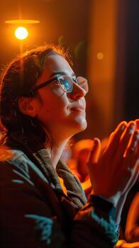 A Woman Expresses Her Joy While Clapping, Immersed in a Live Performance's Energy photo
