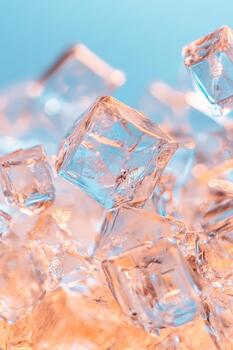 Clear ice cubes with cool and warm light, showcasing delicate textures and shapes, suggesting molecular gastronomy techniques. photo