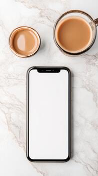 Digital innovation for modern finance, showing a modern device and beverages on a marble surface. photo