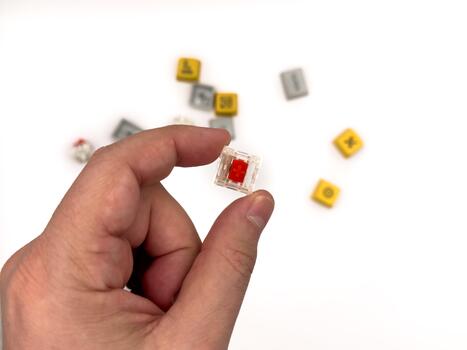 Red switches, Keyboard repair, broken keys, mechanical keyboard, red keycaps, IT, keyboard work, for advertising, white background, copy space photo