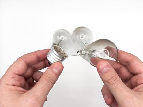 Tungsten light bulb lamp. Non-working light bulb, broken light bulb old lamp photo