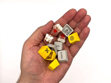 Red switches, Keyboard repair, broken keys, mechanical keyboard, red keycap keyboard work, for advertising, white background, copy space photo