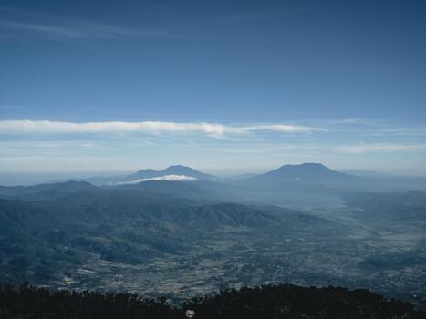 Majestic Mount Marapi and Singgalang View from a Higher Peak in West Sumatra, Indonesia. photo
