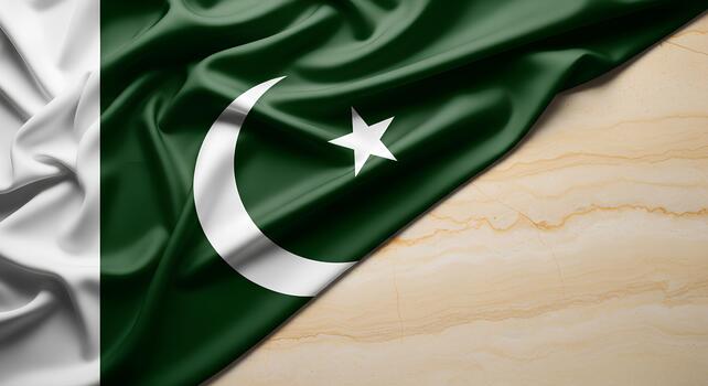 Flag of Pakistan, featuring a green field with a white crescent moon and a five-pointed star, alongside a vertical white stripe. photo