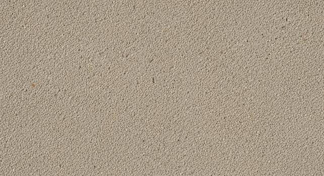 Abstract beige granular surface creating a seamless backdrop, ideal for design elements and digital media backgrounds, emphasizing a subtle, earthy, and rough aesthetic texture photo
