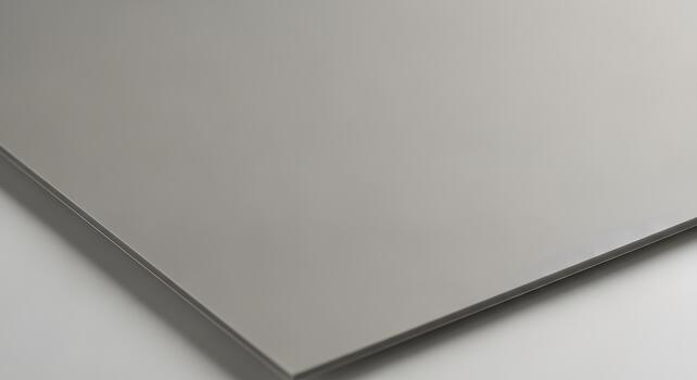 A minimalist abstract of a smooth, elegant grey surface displaying a subtle reflective sheen and refined texture, perfect for modern backgrounds, material concepts, and sophisticated design elements photo