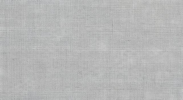 Detailed view of a light gray textile background featuring a delicate crosshatch weave, perfect as a versatile surface texture for modern designs and minimalist aesthetics photo