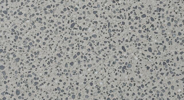 A close-up abstract textured background with a speckled pattern of grey and white aggregate embedded in concrete photo