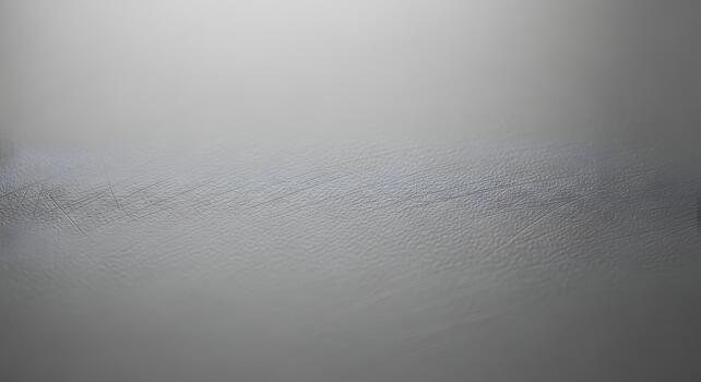 Abstract textured background with subtle lines and a gradient of soft light, creating a minimalist and serene visual photo