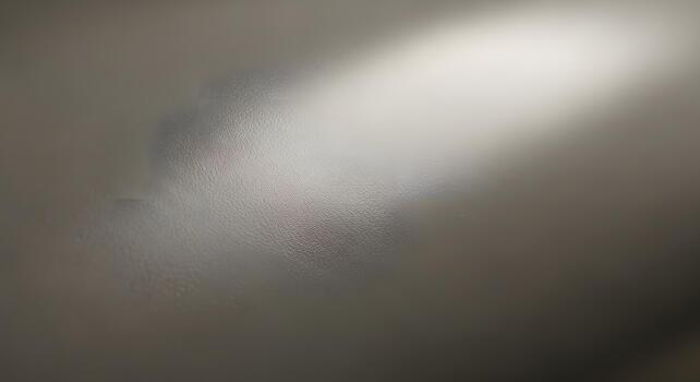 Textured background with subtle lighting creating a soft, diffused effect, perfect for design elements photo