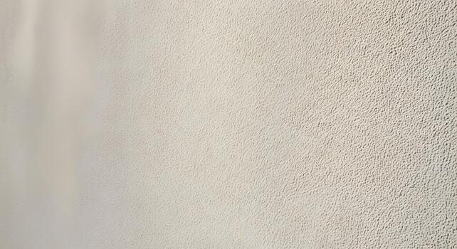 A close-up abstract view of a textured surface, showcasing its intricate details and subtle variations in light and shadow, creating a visually engaging background photo