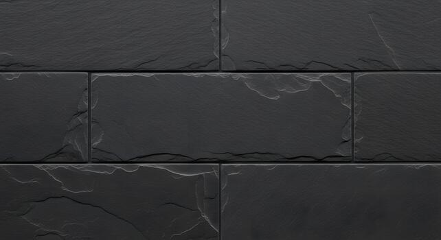 Black Slate Tile Wall Texture Background in Rectangular Patterns for Modern Interior Design photo