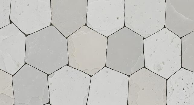 Abstract background of irregular light grey and white hexagonal stone tiles, creating a geometric pattern with natural texture and subtle variations, perfect for modern design concepts photo