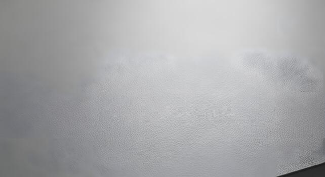 Close-up view of a textured gray surface, offering a minimalist and sophisticated backdrop for design projects photo