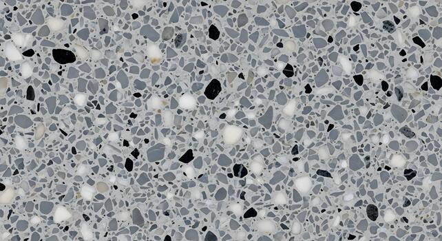 Detailed grey terrazzo texture with a modern speckled pattern. Features white, black, and diverse grey stone fragments, creating a durable and versatile surface for design photo