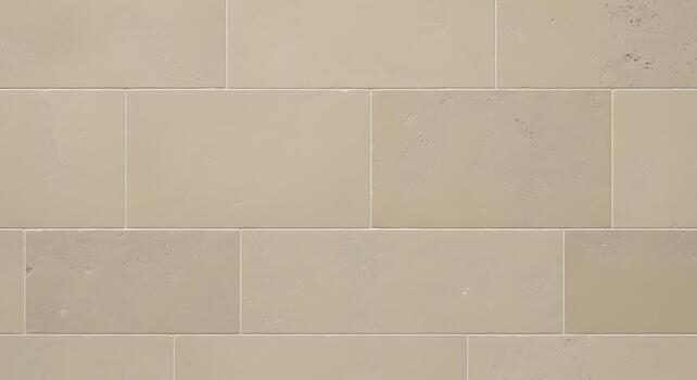 Light beige natural stone wall texture, uniformly cut rectangular blocks with subtle surface variations and clean grout lines, creating an elegant background for architectural design photo