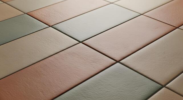 A close-up, abstract view of a tiled surface with a subtle gradient of muted colors, emphasizing texture and pattern photo