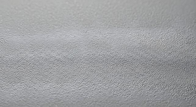 Abstract textured surface with a subtle pattern and gentle light, perfect for backgrounds photo