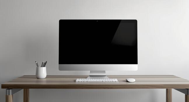 Modern workspace setup featuring a sleek computer and essential accessories, perfect for showcasing digital designs or website mockups on a minimalist desk photo