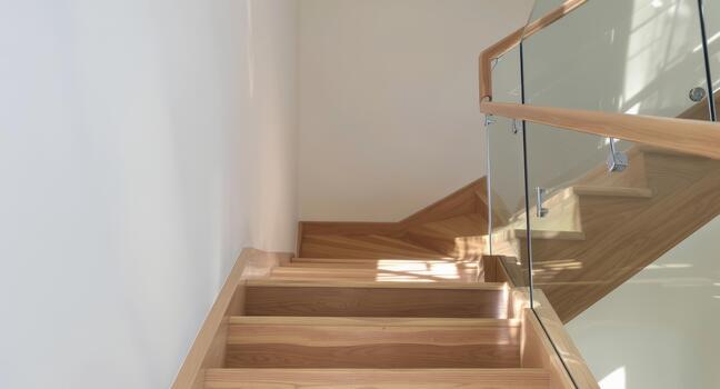 Ascend to new heights with this modern wood staircase design, perfect for showcasing minimalist interiors and architectural brilliance in home design projects photo