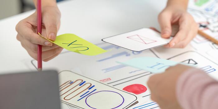 UX UI Design Collaboration with Sticky Notes and Sketches photo