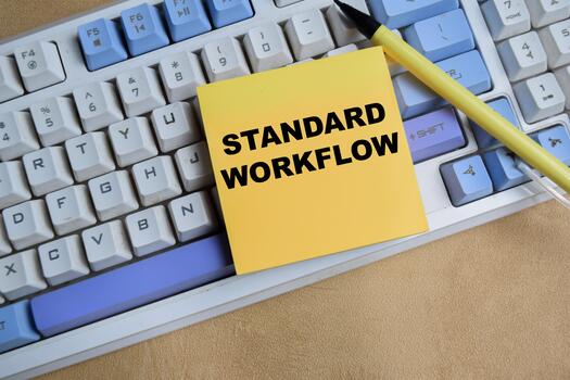 Concept of standard workflow write on sticky notes isolated on keyboard. photo
