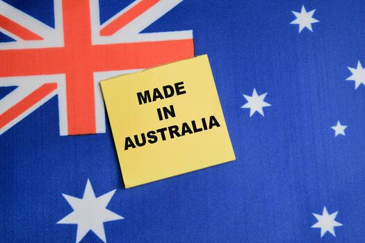 Concept of made in Australia write on sticky notes with Australia flag. photo