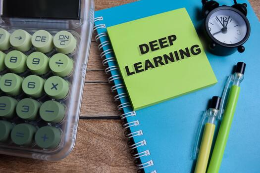 Concept of deep learning write on sticky notes isolated on Wooden Table. photo