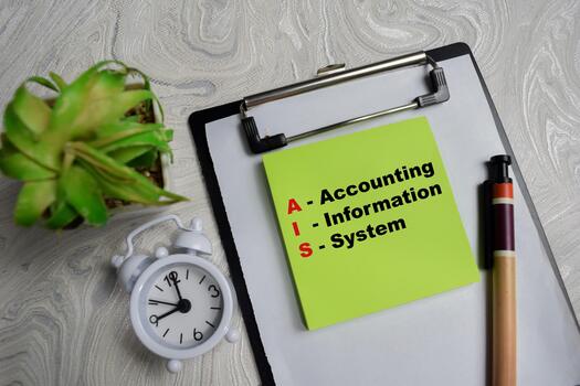 Concept of AIS - Accounting Information System write on sticky notes isolated on Wooden Table. photo