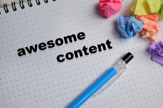 Concept of awesome content write on book isolated on Wooden Table. photo