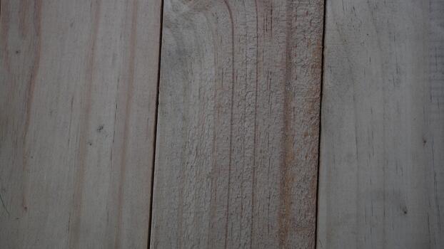 Textured Wooden Surface Displaying Natural Grain Patterns and Subtle Color Variations Ideal for Backgrounds, Designs, and Artistic Projects photo