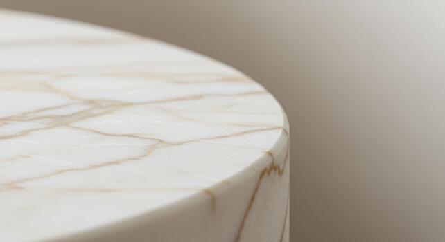 Close up abstract view of white marble round table top showing textured patterns with soft, blurred background showcasing elegance and luxury. photo