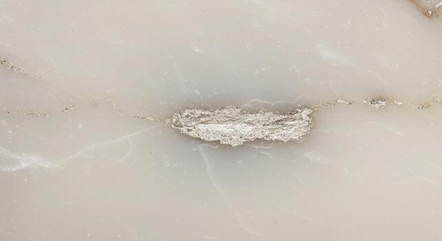 Polished white onyx surface reveals an interesting natural inclusion or imperfection adding character to the smooth stone texture and appearance. photo