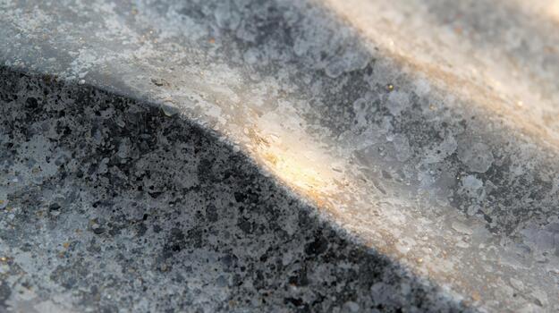 An abstract view showcases an old corrugated metal sheet surface with a play of light and shadow emphasizing texture and weathe, close-up. photo